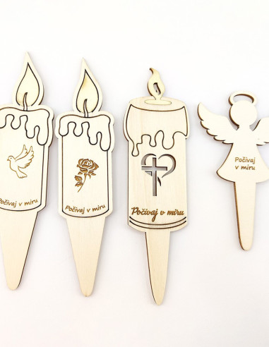 Wooden memorial candles with cross, dove, rose, and angel shapes