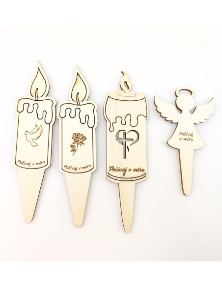 Wooden memorial candles with cross, dove, rose, and angel shapes