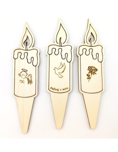 Three wooden grave candles with engraved angel, rose, and dove designs.