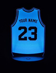 Personalized basketball jersey night light showing custom name and number illuminated. 2