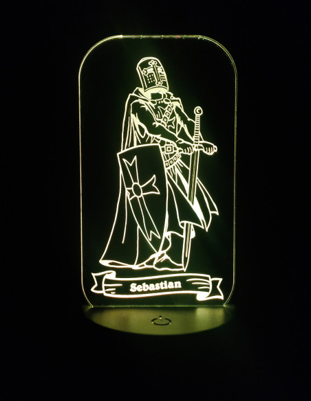 Laser-engraved knight LED lamp on stand, customized with name, glowing with multiple color options.