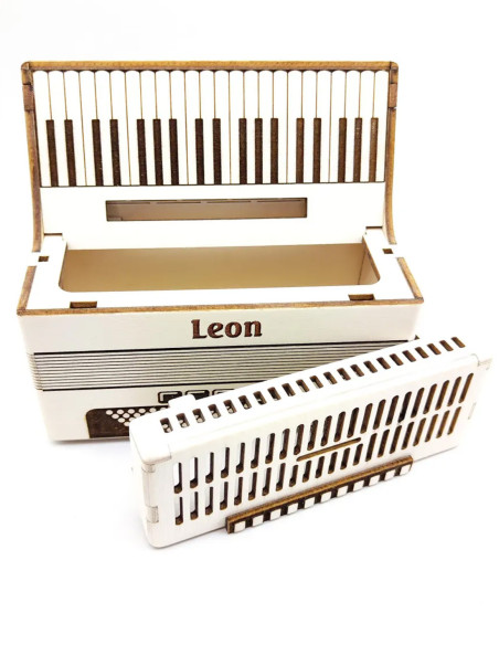 Caja de ahorro en forma de acordeón con teclas de piano