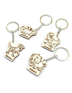 Set van dinosaurus sleutelhangers met naam op maat in verschillende designs