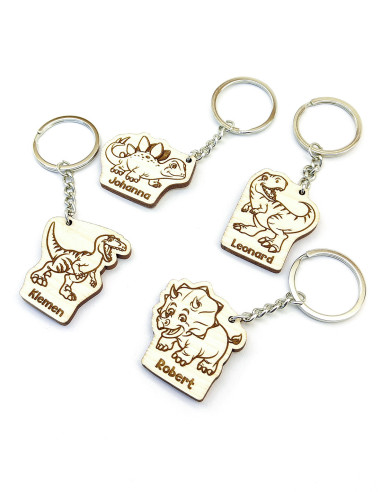Set van dinosaurus sleutelhangers met naam op maat in verschillende designs