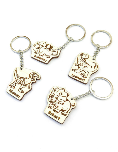 Set van dinosaurus sleutelhangers met naam op maat in verschillende designs