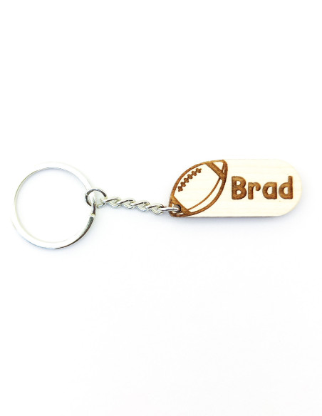Custom keychain featuring football design and engraved name