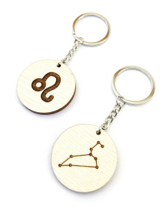 Two personalized Leo keychains with different zodiac designs