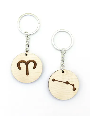 Two custom astrology keychains showing Aries constellation and symbol