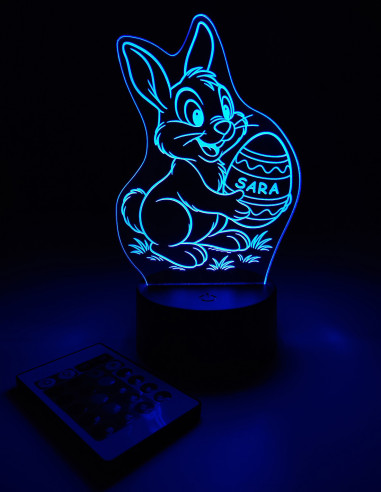 Luce decorativa di Pasqua con coniglietto e uovo inciso