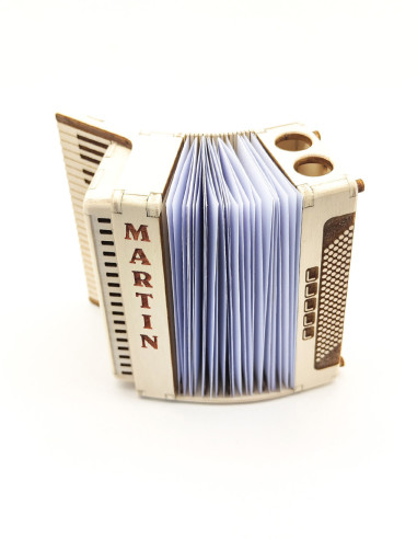 Close-up of accordion-style organizer with paper slips inside.