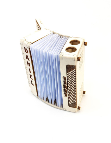 Side view of accordion desk organizer showing engraved wooden detail.