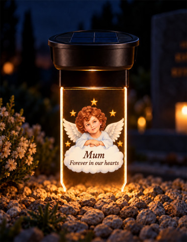 Personalized angel solar grave candle glowing at night with Mum forever in our hearts message