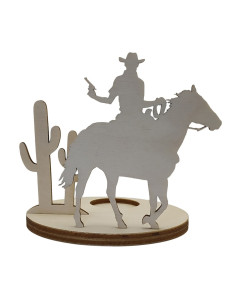 Wooden candle holder showing a cowboy on horseback with desert cactus