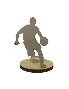 Wooden candle holder of a basketball player dribbling