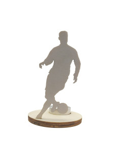 Wooden candle holder featuring a football player dribbling