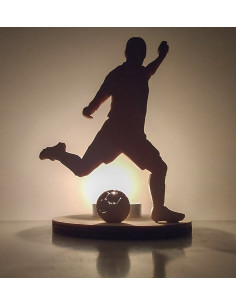 Photophore joueur de football en pleine frappe de balle 2