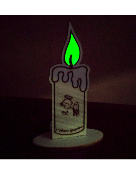 Wooden tribute candle with glowing flame and engraved message