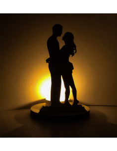 Wooden candle holder with hugging couple silhouette design 2