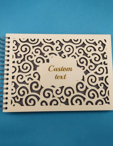 album fotografico personalizzato con copertina intagliata in legno