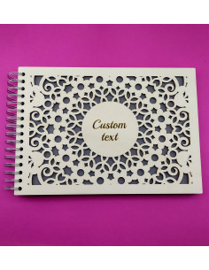 Personalized wooden photo album with flower-pattern cutout and custom engraved name 2