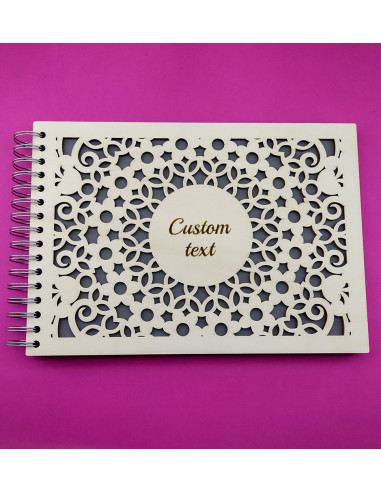 album fotografico in legno con decorazione floreale traforata