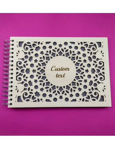 album fotografico in legno con decorazione floreale traforata